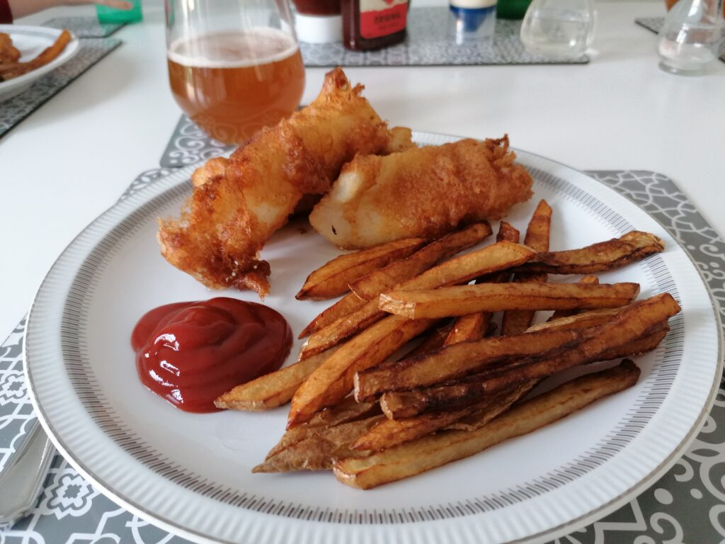 Haddock in beer batter frying