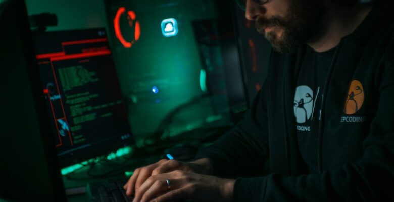 Torq HyperSOC: Meet Socrates, the Omni-Agent Running Your SOC 1 man in black jacket using computer